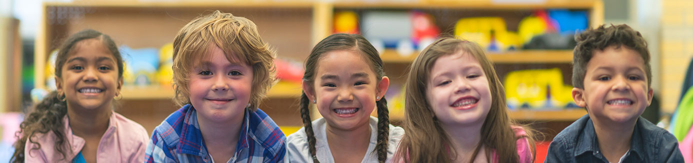 Happy children in a classroom setting