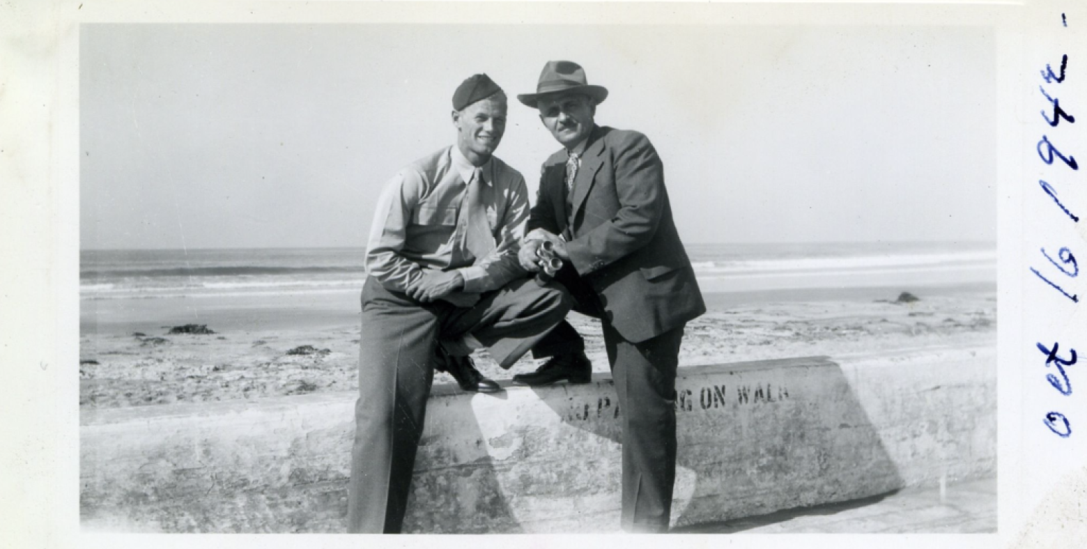 Dick Joseph and his son, Levon, by the ocean