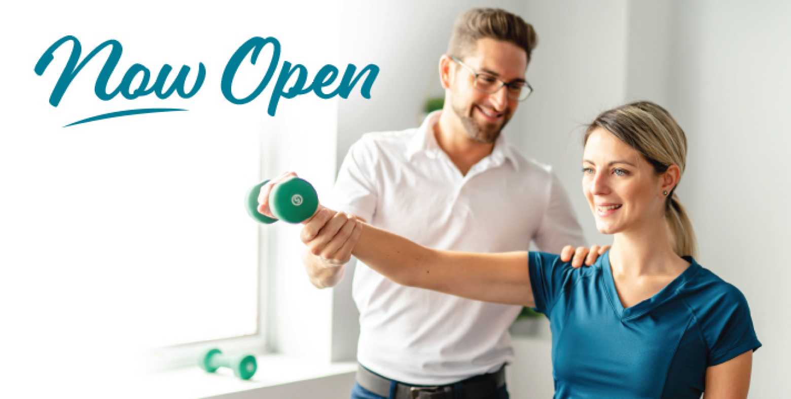 "Now Open" text and physical therapist helping patient do exercise with dumbbell 