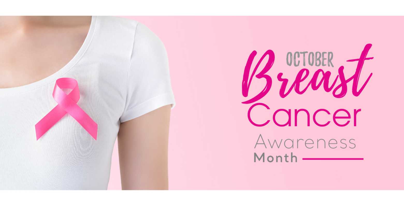 Female chest with pink ribbon pin and text saying October is Breast Cancer Awareness Month