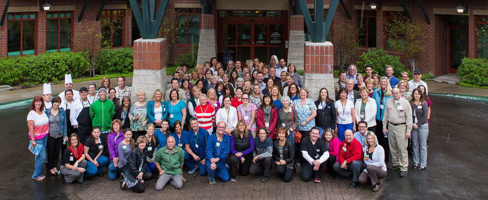 Huge group of Tahoe Forest Hospital staff in front of hospital