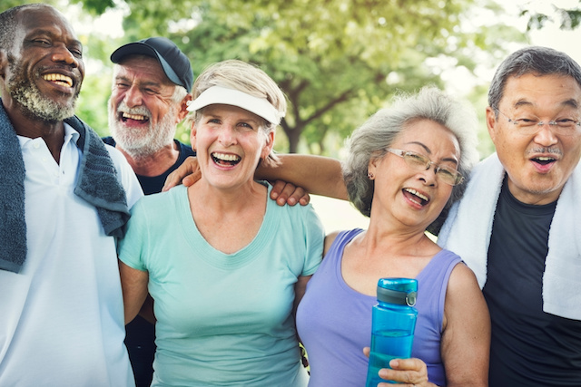 group of diverse seniors laughing together