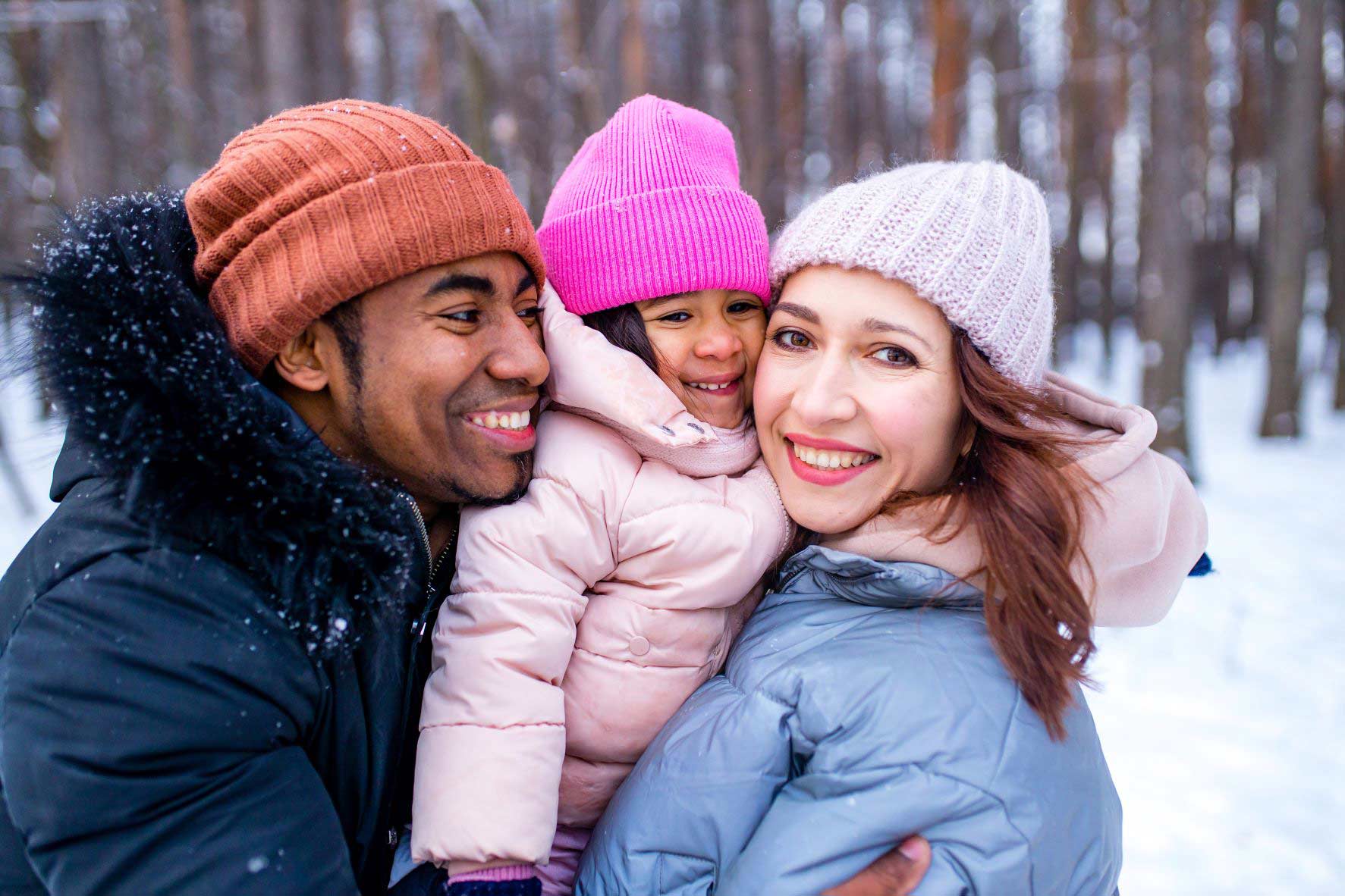 happy family in the outdoors during winter