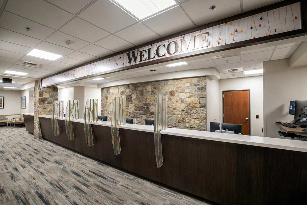 Front desk with welcome sign for multi specialty clinics on 2nd floor of Tahoe Forest Cancer Center