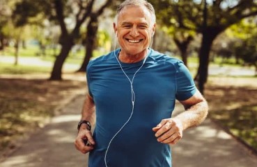 smiling man jogging