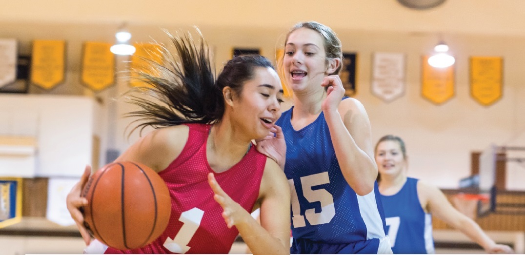 girls playing basketball