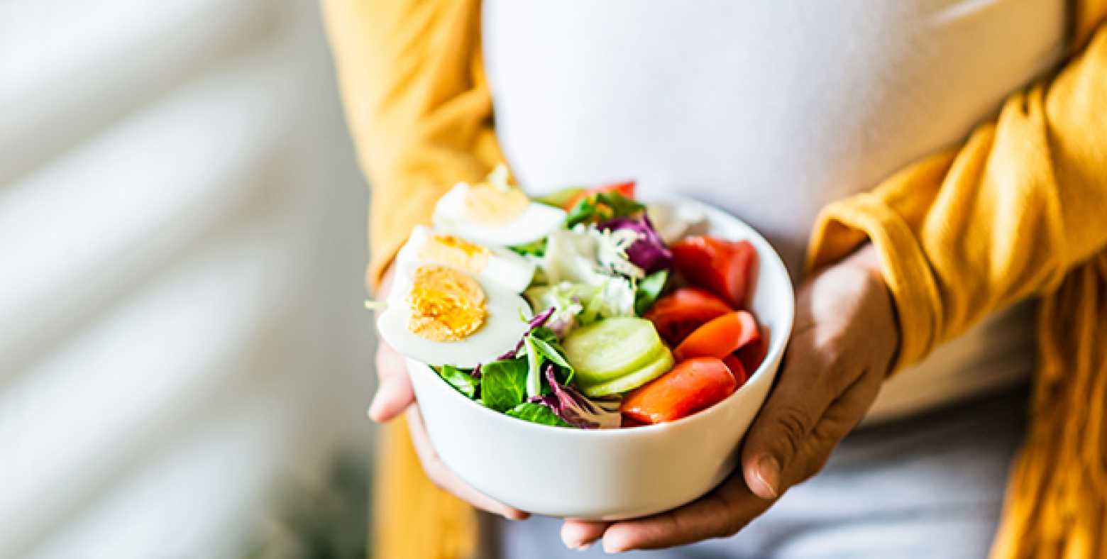 bowl of fresh veggies and boiled eggs