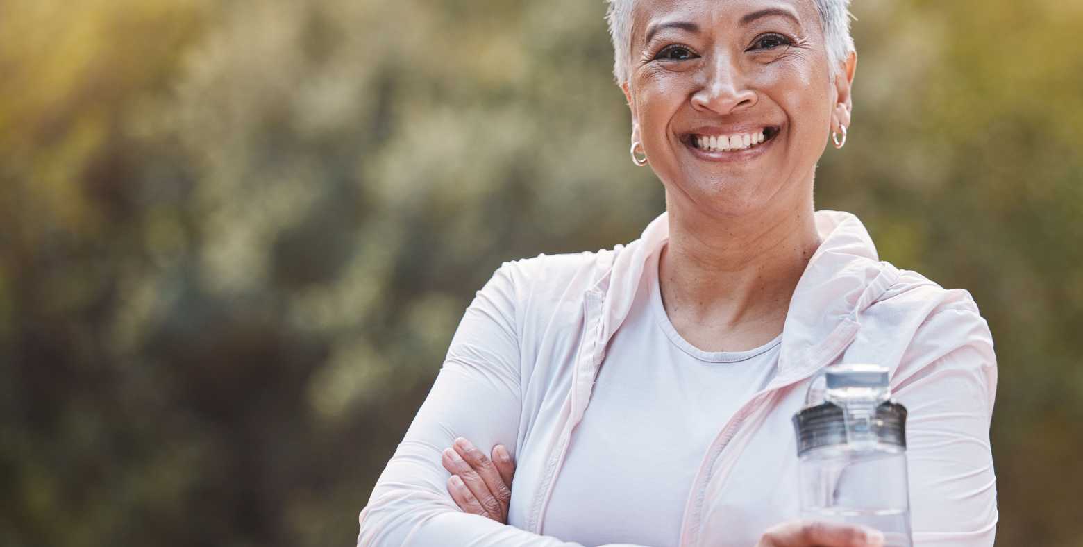 woman smiles broadly