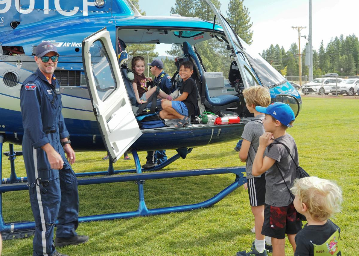 kids exploring helicopter